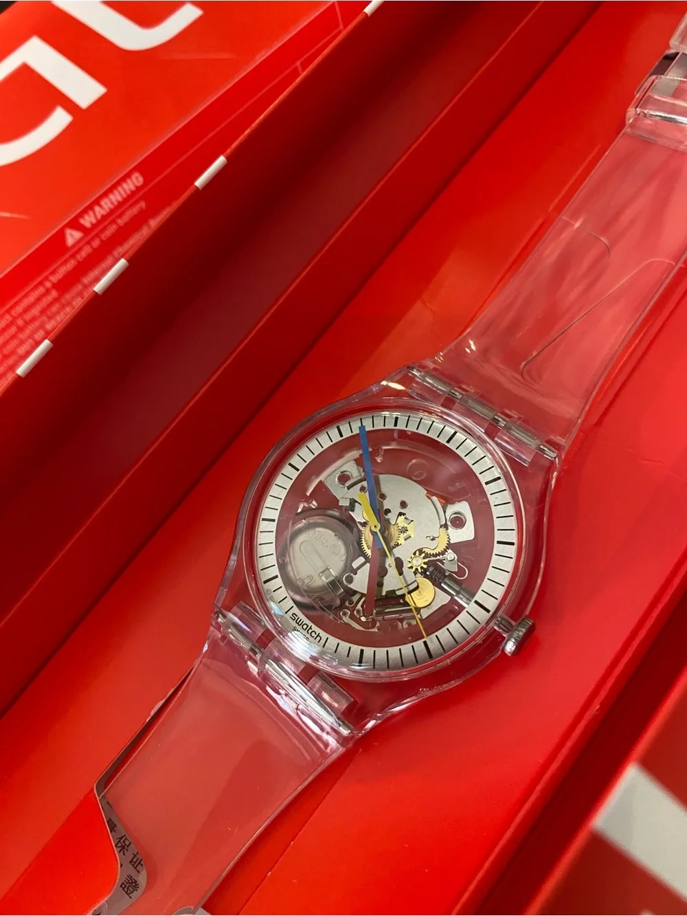 Swatch Transparent Strap Skeleton Watch with Blue Second Hand
